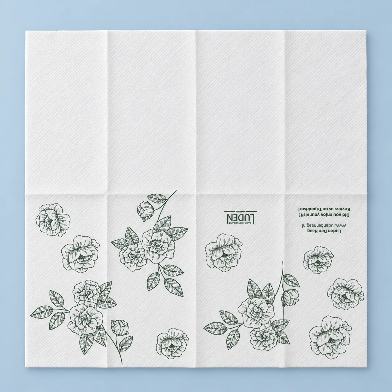 Luden Den Haag · Airlaid napkin · unfolded · The complete design · 40 × 40 cm